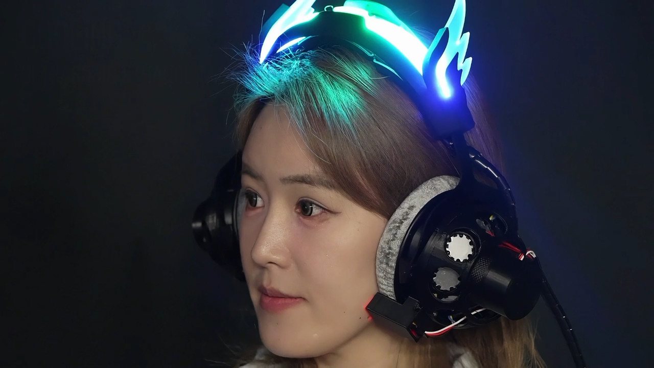 Jiayi Xu wearing MoHeat Evo thermal headphones glowing blue